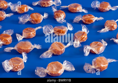 Pile Of Clear Cellophane Wrapped Toffee Sweets Stock Photo - Alamy