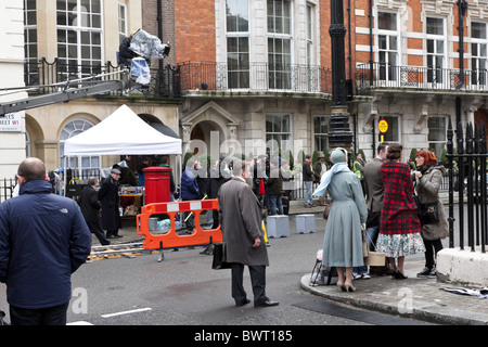 Film crew live action filming My week with Marolyn in Charles St, Mayfair, London. Stock Photo