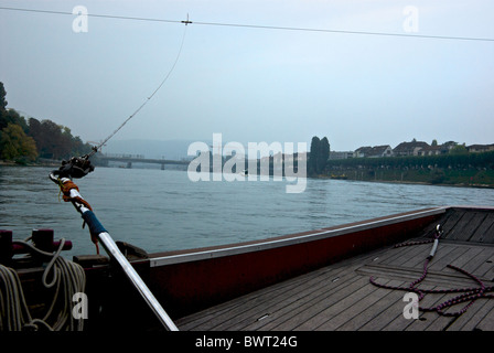 Nonmotorized current driven commuter cable reaction ferry across Rhine River Basel Switzerland Stock Photo