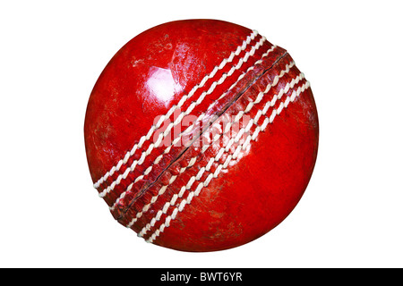 Photo of a red leather cricket ball isolated on white background with clipping path done using pen tool. Stock Photo