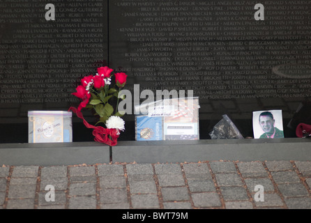 Personal items and flowers left at the Vietnam Veterans Memorial in Washington, DC. Stock Photo