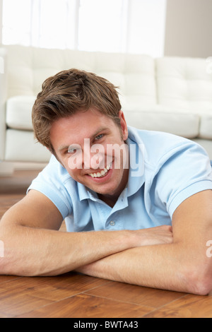 Young Man Relaxing At Home Stock Photo