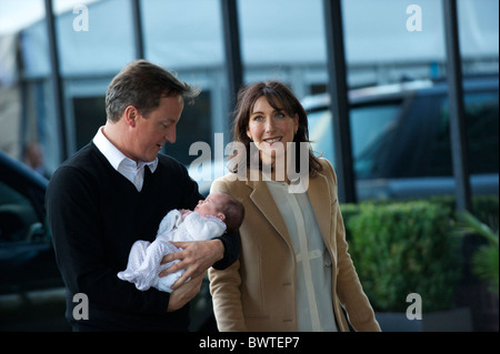 Prime Minister David Cameron, wife, Samantha, and baby daughter, Florence Rose Endellion, arrive at their hotel on the third, Stock Photo