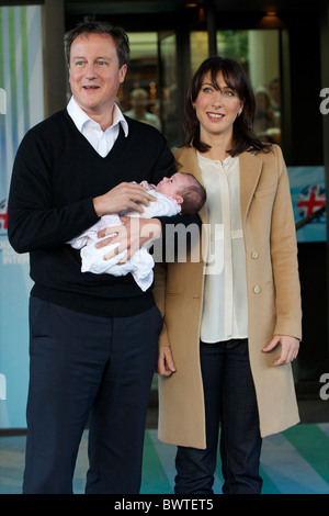 Prime Minister David Cameron, wife, Samantha, and baby daughter, Florence Rose Endellion, arrive at their hotel on the third, Stock Photo