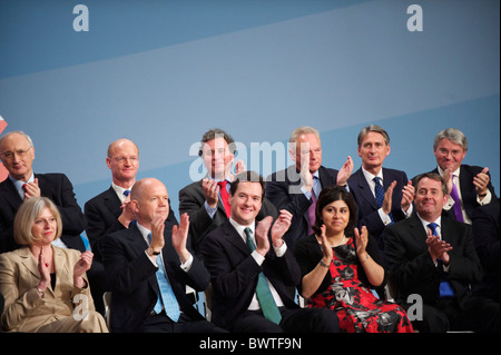 Members of the Prime Minister David Cameron's cabinet applaud as he delivers his leader's speech on the fourth, and final, day Stock Photo