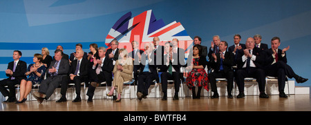 Members of the Prime Minister David Cameron's cabinet listen to his leader's speech on the fourth, and final, day of the Stock Photo