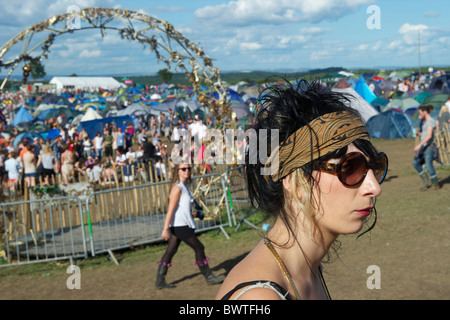 Music revelers take in the quieter moments of Bestival 2010 in Newport, Isle of Wight, England on September 12, 2010. Stock Photo