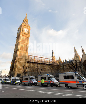 The Houses of Parliament and big Ben with a police boat on the Thames ...