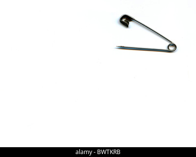 Safety pin isolated on the white background Stock Photo