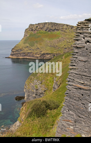 On the south west coast path approaching the headland near Boscastle known as Willapark and the coastguard lookout station Stock Photo