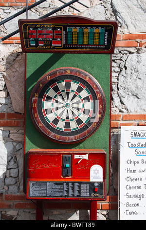 Dartboard outside pub in Spanish resort Stock Photo
