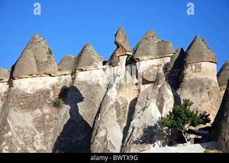 at Goreme Turkey Anatolia Asia erosion fairy chimney chimneys mountain mountains earth pyramids rocks rock Stock Photo