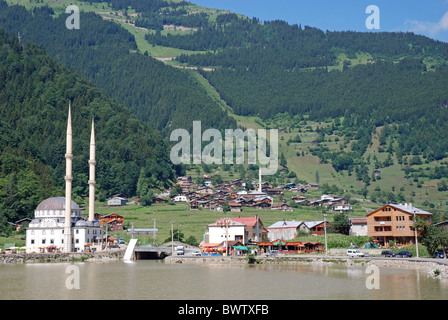 Turkey Uzungol Lago Maggiore Kackar mountains Anatolia Asia South of Trabzon city mosque minaret shore house Stock Photo