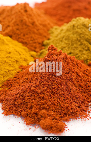 Collection of different hot and exotically spices as closeup on white background Stock Photo