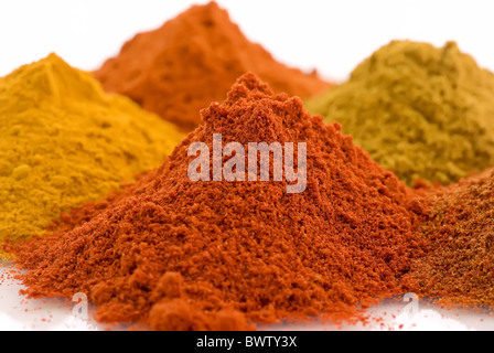 Collection of different hot and exotically spices as closeup on white background Stock Photo