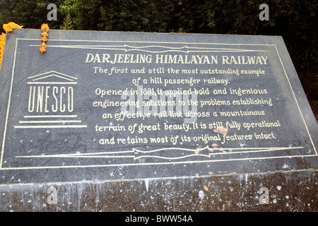 A Unesco plaque at Ghoom (or Ghum) station honours the Darjeeling Himalayan Railway opened 1881 and still 'fully operational' Stock Photo