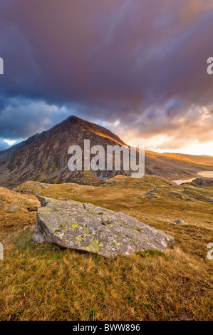 Pen yr Ole Wen from the slopes of Pen y Beglog. Llyn Ogwen just visible under a dramatic sky Snowdonia, North Wales Stock Photo