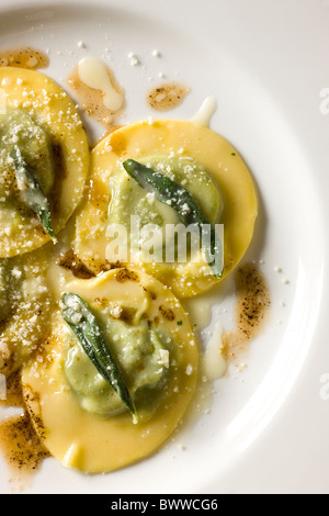 Ravioli with Spinach and Ricotta, fresh sage and Parmesan Stock Photo