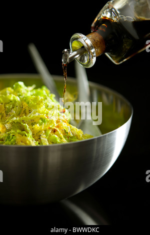 Shredded Savoy Cabbage with Black Pepper, olive oil and Sherry Vinegar Stock Photo
