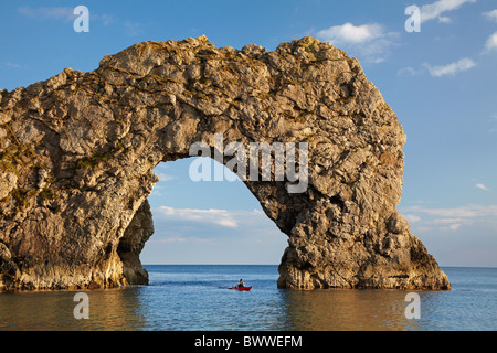 Durdle Door Arch, and sea kayaker, Jurassic Coast World Heritage Site, Dorset, England, United Kingdom Stock Photo