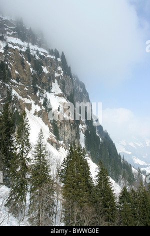 Steep cliff at Swiss Alpine Mountain range. View from Mt Titlis in Switzerland. Stock Photo