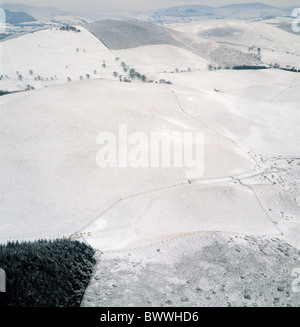 View from Foel Fenli looking south along the snow covered Clwydian Range, North Wales, on The Offas Dyke path. Stock Photo