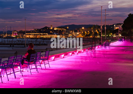 Colourful lighting on the promenade in the ' Croissette' area of Cannes