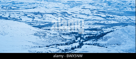 Dawn view of winter landscape from Summit of Pen Y Fan, Brecon Beacons national park, Wales Stock Photo