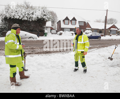 Council workers taking a tea break from clearing snow. Stock Photo