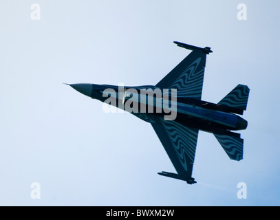 Belgian F-16A F16 Eastbourne Airbourne Airshow Air Show in flight underside visible as it lies on its side show markings Stock Photo