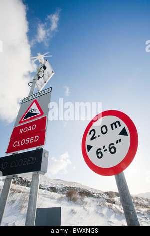 Road closed signs on Kirkstone Pass, Lake District, UK. Stock Photo