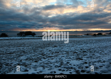 winter sunset on the coast Stock Photo