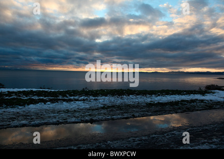 winter sunset on the coast Stock Photo