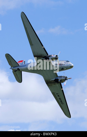 Douglas C-53D Skytrooper (DC-3A Dakota) banking in for a flypast at Duxford Flying Legends Airshow Stock Photo