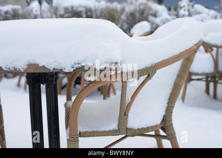 Patio Furniture Covered in Snow Stock Photo
