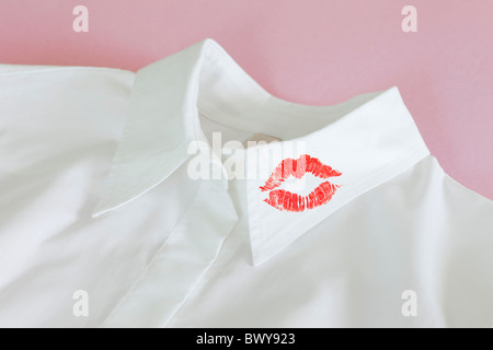 Lipstick Kiss on Shirt Collar Stock Photo