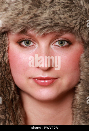 Russian woman wearing fur hat Stock Photo