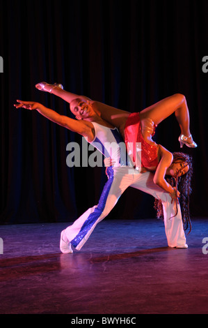 acrobatics couple Dance dance hall dancer dancing Dynamic image Lifestyle Live modern performance stage Stock Photo