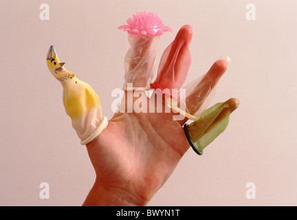 amusing condom condoms different Hand humor prevention Stock Photo