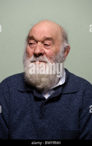 Isolated portrait of caucasian bald old man with long white beard