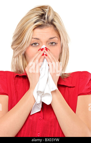 Infected woman blowing his nose in tissue paper because of being ill