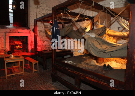 Installation showing the hammocks of prisoners of war inside Edinburgh Castle in Scotland. Stock Photo