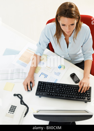 woman working on computer in office Stock Photo