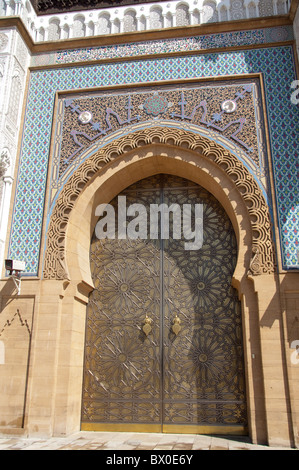 Africa, Morocco, Casablanca. Royal Palace entry, bronze door detail with ornate tile and mosaic trim. Stock Photo