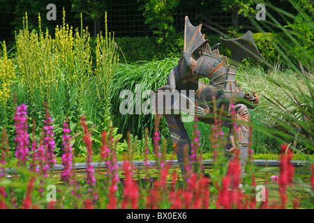 The summer display in the Dragon Garden in Knoll Gardens in Wimborne, Dorset, England, UK Stock Photo