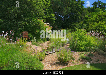 The summer display in the Gravel Garden in Knoll Gardens in Wimborne, Dorset, England, UK Stock Photo