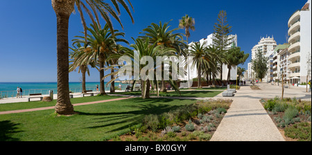 Portugl, the Algarve, Armacao de Pera gardens on the promenade (and the Holiday Inn Hotel) Stock Photo