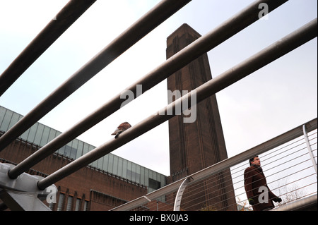 View up at Millennium Bridge and Tate Modern, Stock Photo