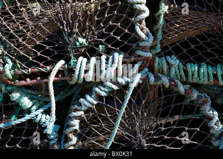 Lobster pots tied with blue rope, County Kerry Ireland Stock Photo