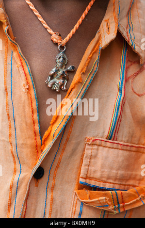 Indian hindu boy wearing a hanuman pendant Stock Photo